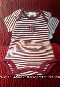 Baby Texas Aggie Onesie with the ATM logo 